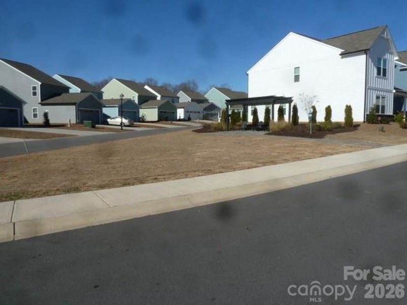 Front exterior of a new home in Wilkerson Place, York, SC, highlighting curb appeal (Image 24). Front exterior of a new home in Wilkerson Place, York, SC, highlighting curb appeal (Image 24).