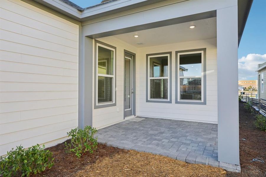 Exterior details and patio area of a home in Weslyn Park Single Family, St. Cloud (Image 15).