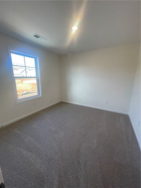 Spacious, unfurnished interior of a new home in Springwood Grove, Central (Image 33).