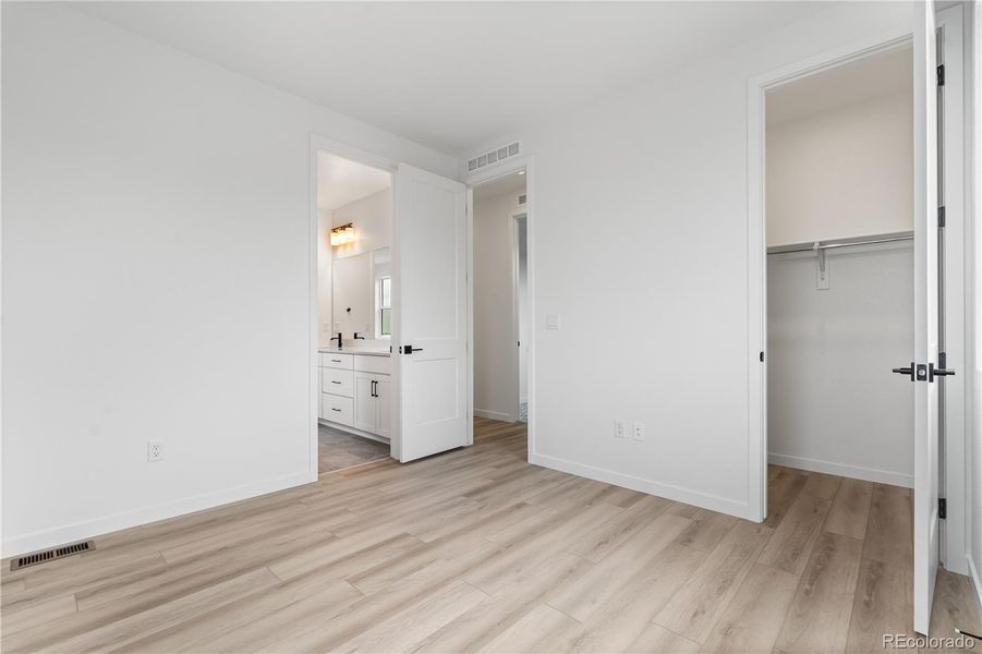 Spacious, unfurnished interior of a new home in Tribute at Lyric, Lone Tree (Image 20).