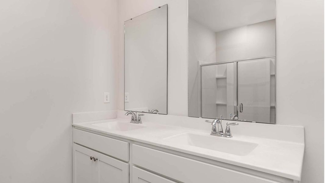 Representative furnished interior of a home built from the ARIA by D.R. Horton in Sandridge Park, Little River (Image 9).