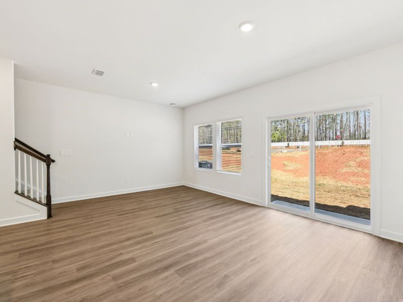 Spacious, unfurnished interior of a new home in Rocky River Towns, Charlotte (Image 8).