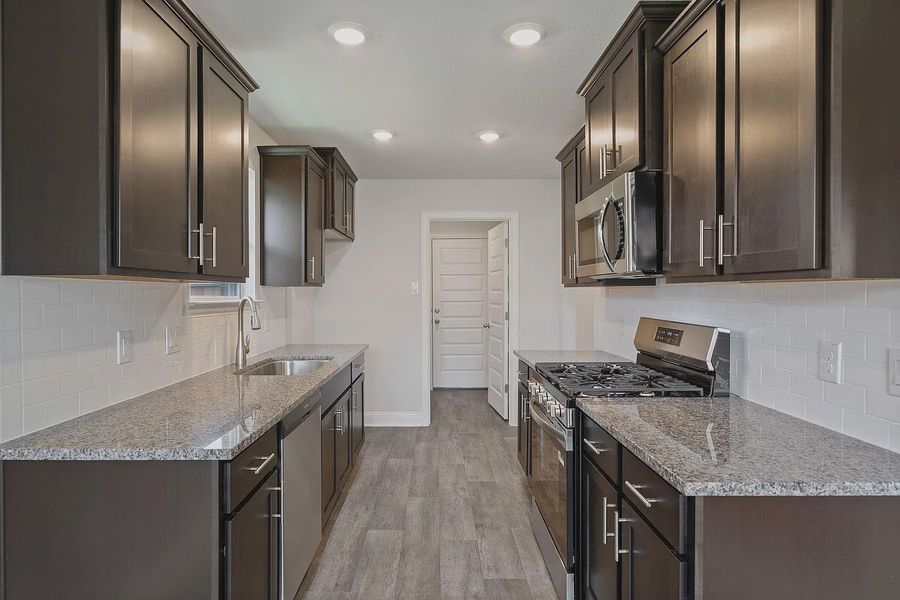 Furnished interior view inside a new home in Grand Oaks Reserve, Cleveland (Image 5).