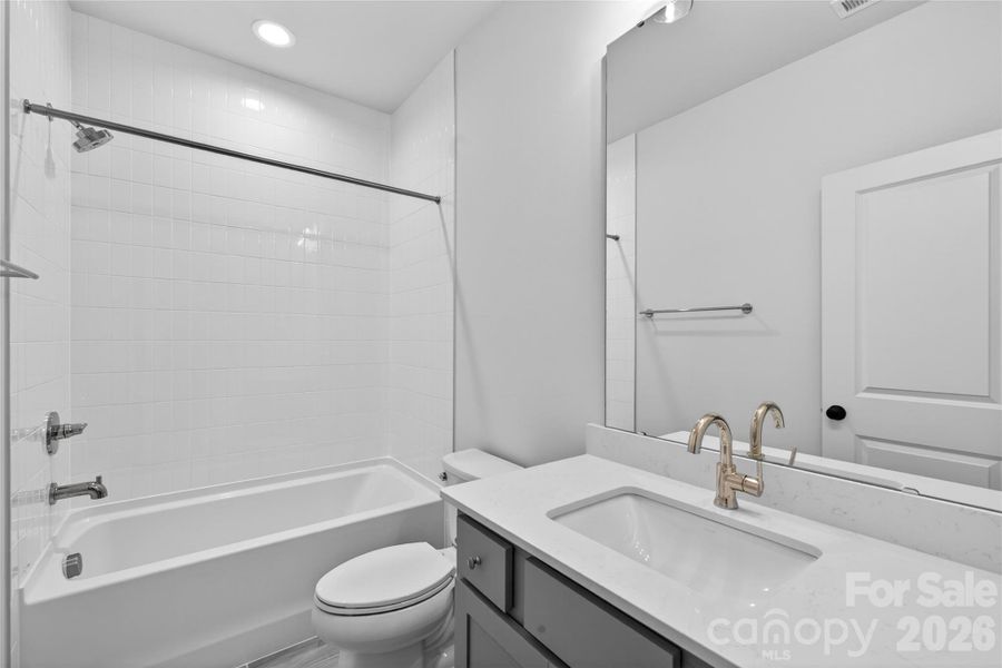 Bath #3 with tile shower. Bath #3 with tile shower.