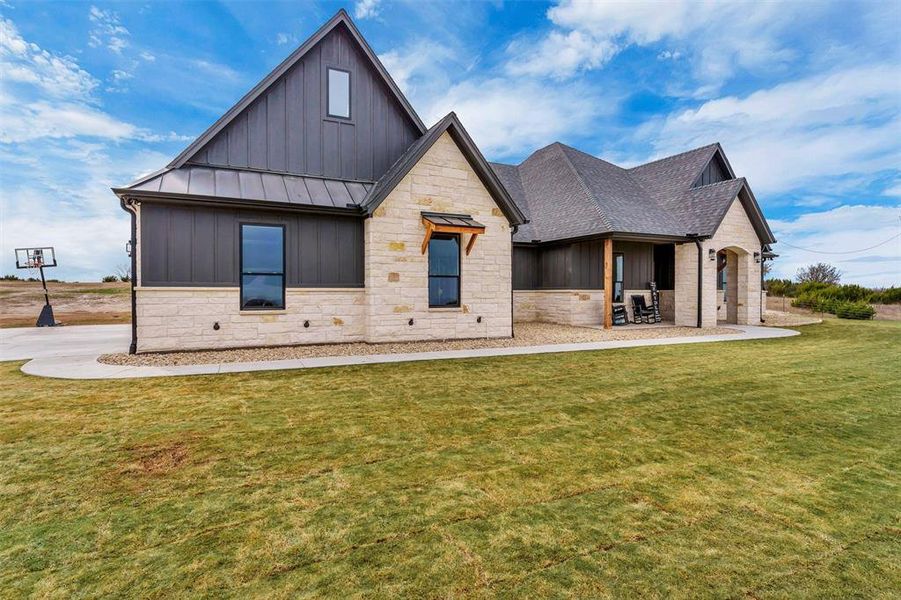 Front exterior of a new home in , Godley, TX, highlighting curb appeal (Image 21). Front exterior of a new home in , Godley, TX, highlighting curb appeal (Image 21).