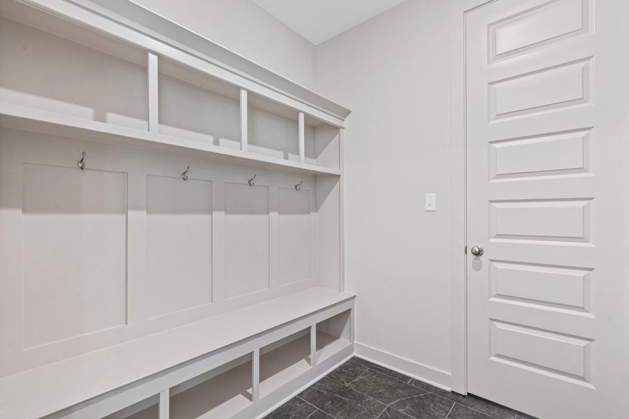 Mudroom featuring baseboards