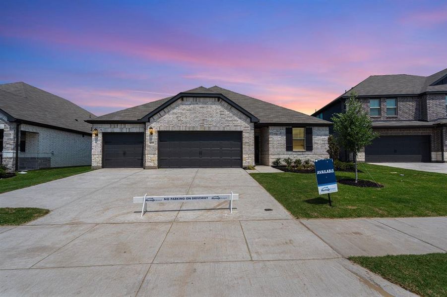 Front exterior of a new home in Lakehaven - Premier Series, Farmersville, TX, highlighting curb appeal (Image 17). Front exterior of a new home in Lakehaven - Premier Series, Farmersville, TX, highlighting curb appeal (Image 17).