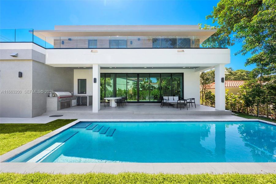 Exterior details and patio area of a home in , Miami Beach (Image 4). Exterior details and patio area of a home in , Miami Beach (Image 4).