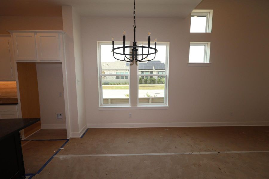 In-progress construction of a new home in Pomona - Grove Row Collection, Manvel, TX (Image 10).
