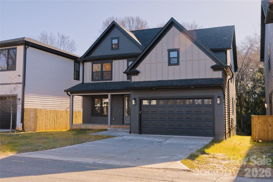Front exterior of a new home in , Charlotte, NC, highlighting curb appeal (Image 17).