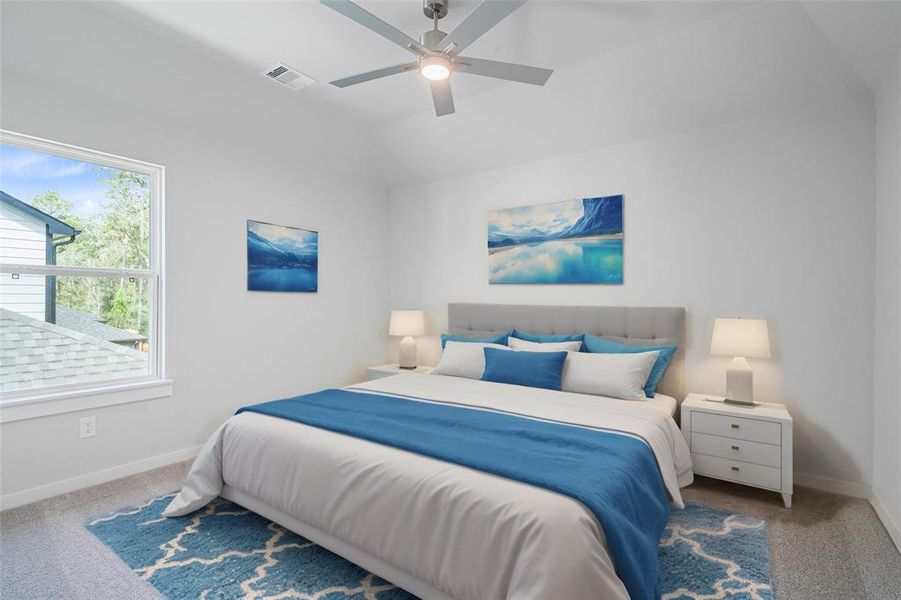 Secondary bedroom features plush carpet, custom paint, ceiling fan with lighting and a large window with privacy blinds.