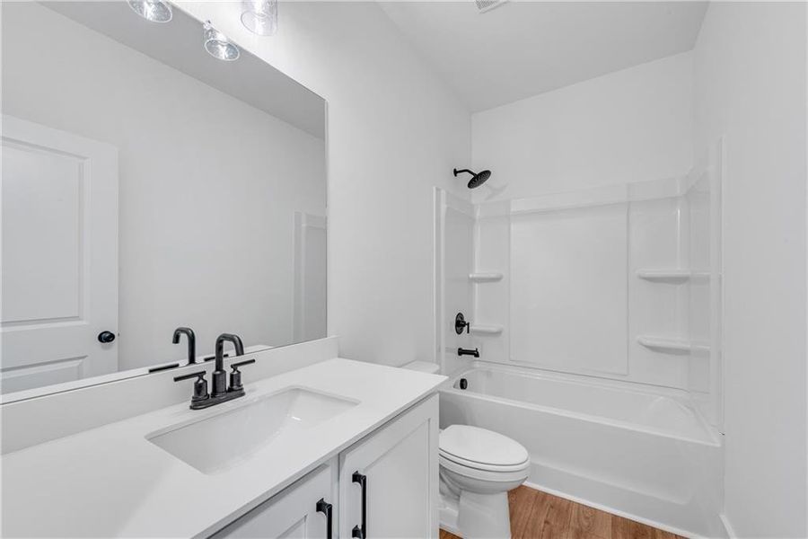 Furnished interior view inside a new home in , Suwanee (Image 9).