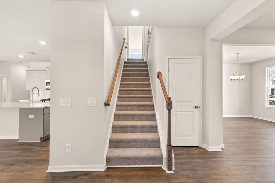 Spacious, unfurnished interior of a new home in Waterside at Lakes of Cane Bay: Coastal Collection, Summerville (Image 12).