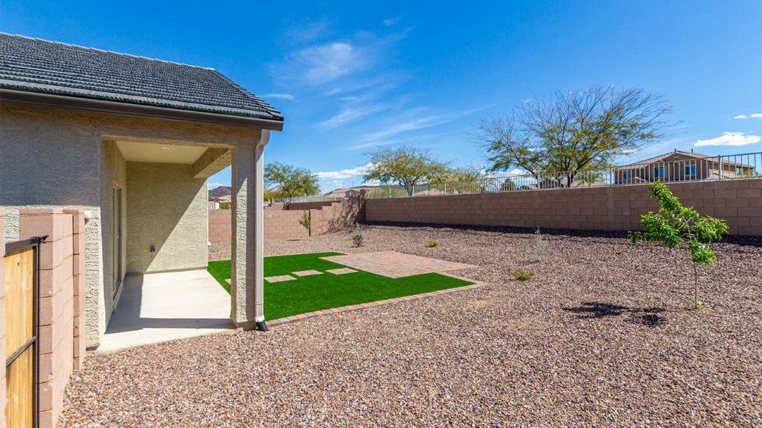 Front exterior of a new home in Saguaro Bloom, Marana, AZ, highlighting curb appeal (Image 2). Front exterior of a new home in Saguaro Bloom, Marana, AZ, highlighting curb appeal (Image 2).
