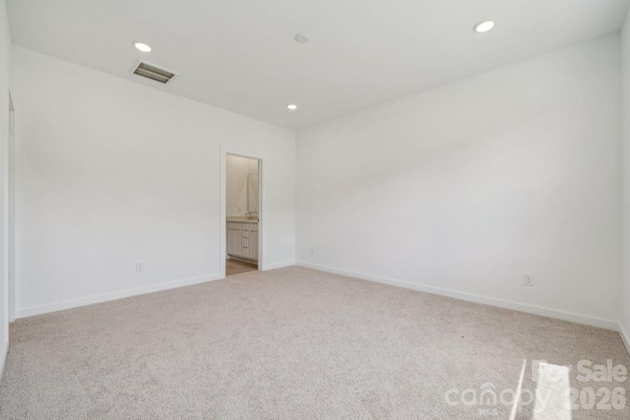 Spacious, unfurnished interior of a new home in Meadow Creek Village, Locust (Image 9).