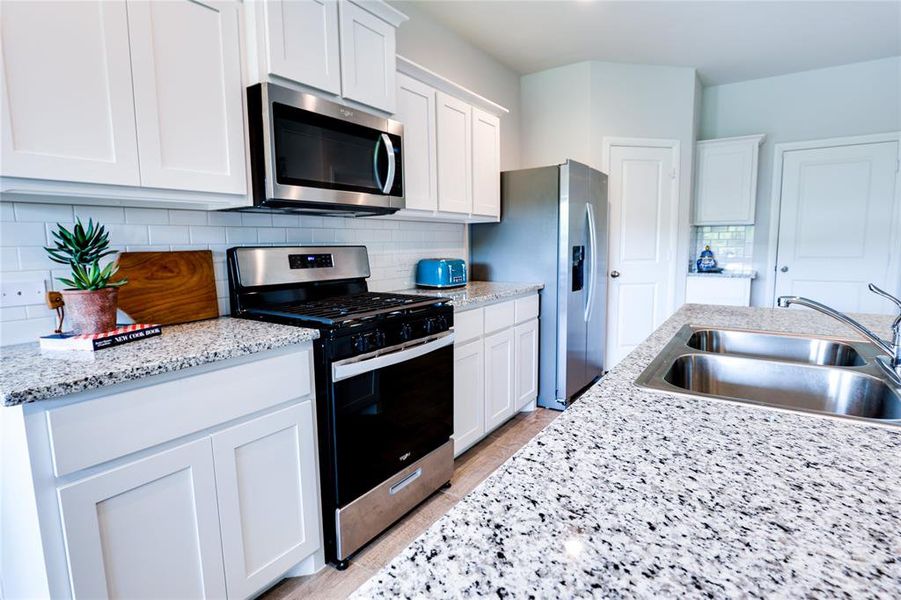 Gas stove and Beautiful granite countertops