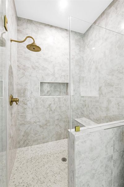 This spacious shower is accented with beautiful vintage hardware. This spacious shower is accented with beautiful vintage hardware.