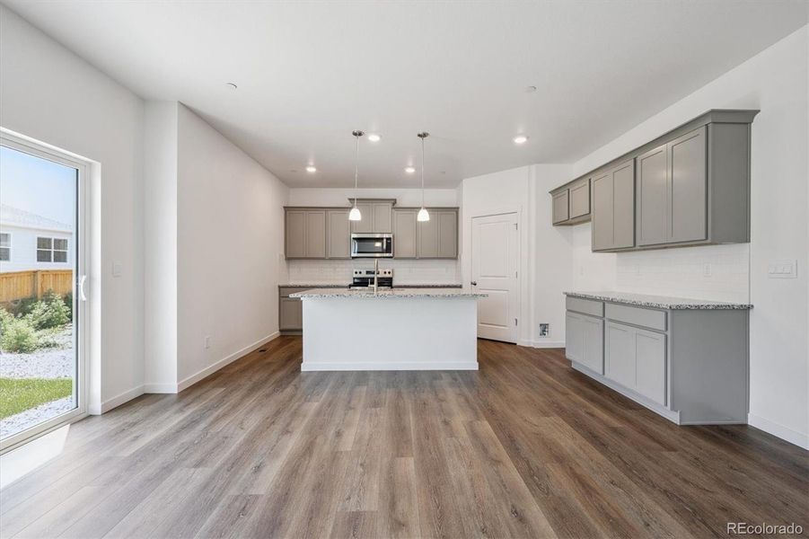 Furnished interior view inside a new home in Silver Peaks, Lochbuie (Image 4).