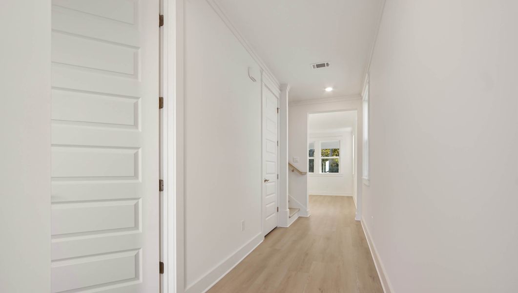 Representative unfurnished interior of a home built from the Ava by D.R. Horton in Parkside, Santa Rosa Beach (Image 11).