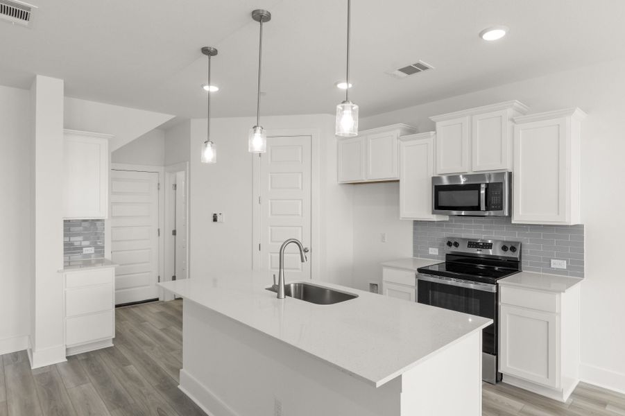 Furnished interior view inside a new home in Avery Centre, Round Rock (Image 5).