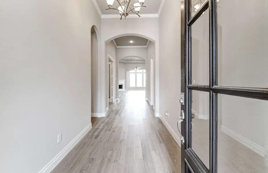 Representative unfurnished interior of a home built from the 2909 by Ravenna Homes in The Woodlands Hills 65′, Willis (Image 18). Representative unfurnished interior of a home built from the 2909 by Ravenna Homes in The Woodlands Hills 65′, Willis (Image 18).