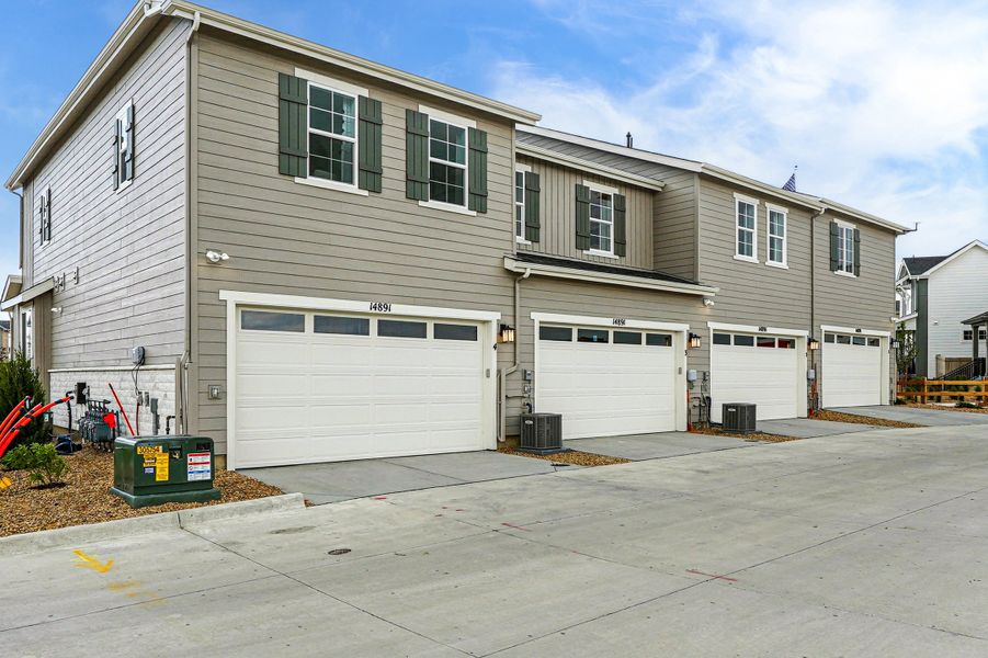 Representative exterior photo of a completed home built from the Discovery by Taylor Morrison in Parterre Townhomes - The Westerly Collection, Thornton, CO (Image 20).