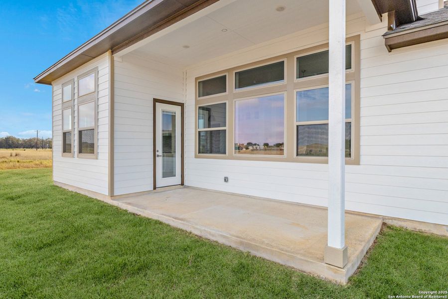 Exterior details and patio area of a home in Pradera Ridge, Floresville (Image 16). Exterior details and patio area of a home in Pradera Ridge, Floresville (Image 16).