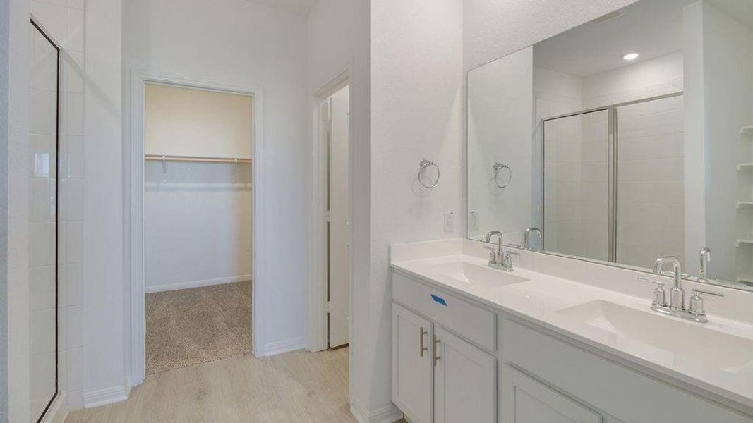 Furnished interior view inside a new home in Caldwell Crossing, Iowa Colony (Image 3).
