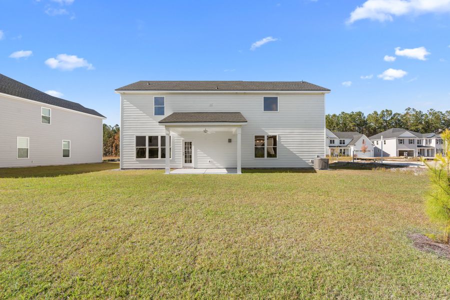 Exterior details and patio area of a home in McAllister Pointe, Richmond Hill (Image 3).