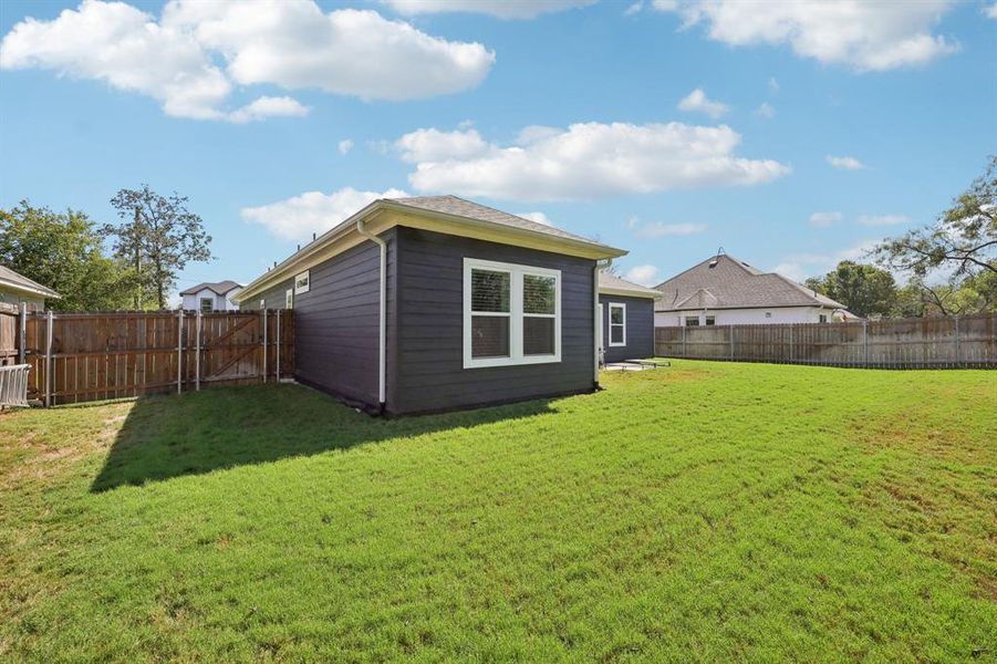 Exterior details and patio area of a home in , Granbury (Image 3). Exterior details and patio area of a home in , Granbury (Image 3).