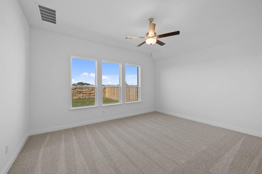 Primary Bedroom with elevated ceiling