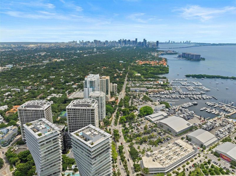 Drone view of the iconic Mr. C Residences Coconut Grove showcasing distinctive architecture, prime South Bayshore location, and proximity to Biscayne Bay.