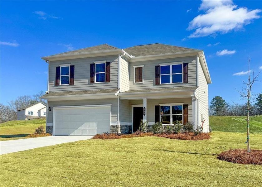 Front exterior of a new home in Jones Ridge, Dallas, GA, highlighting curb appeal (Image 2). Front exterior of a new home in Jones Ridge, Dallas, GA, highlighting curb appeal (Image 2).