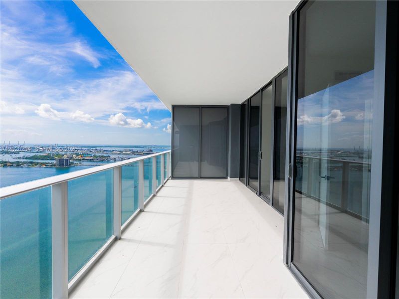 Exterior details and patio area of a home in Aria Reserve, Miami (Image 16).