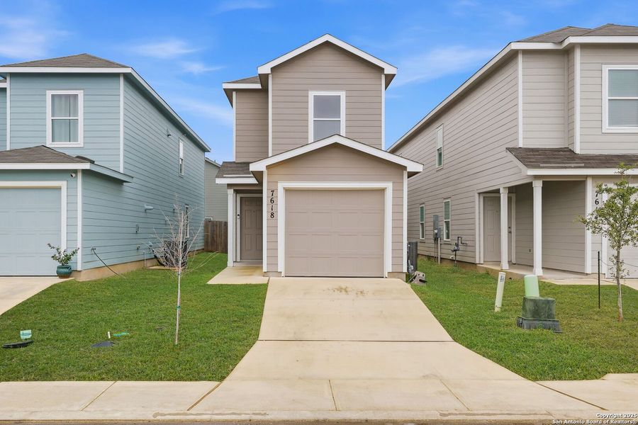 Front exterior of a new home in Aston Park: Wellton Collection, San Antonio, TX, highlighting curb appeal (Image 2).
