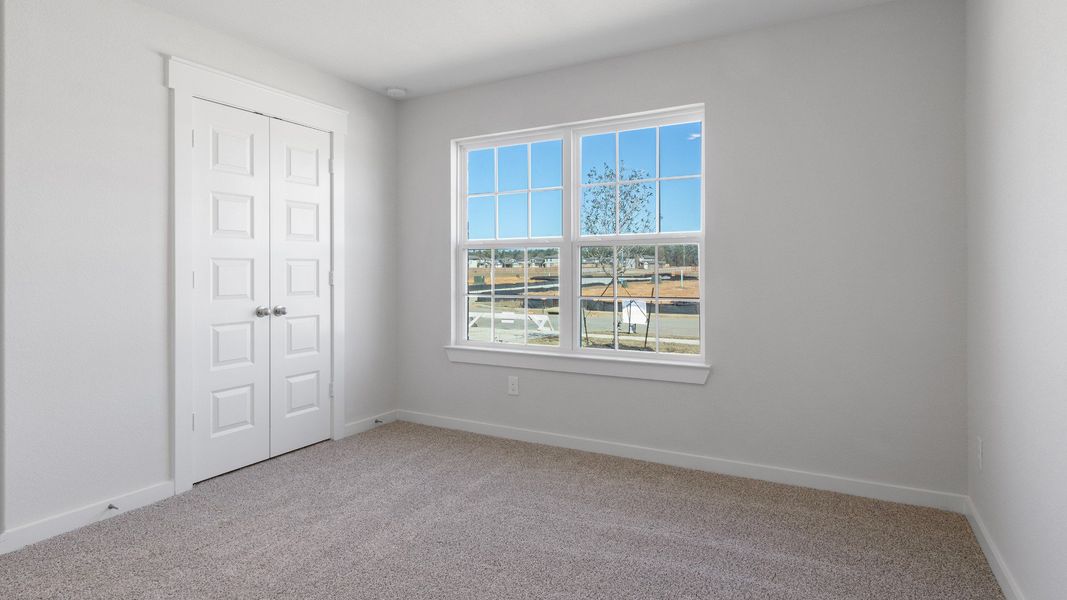 Representative furnished interior of a home built from the Blanton by Brightland Homes in Cielo, Conroe (Image 11).