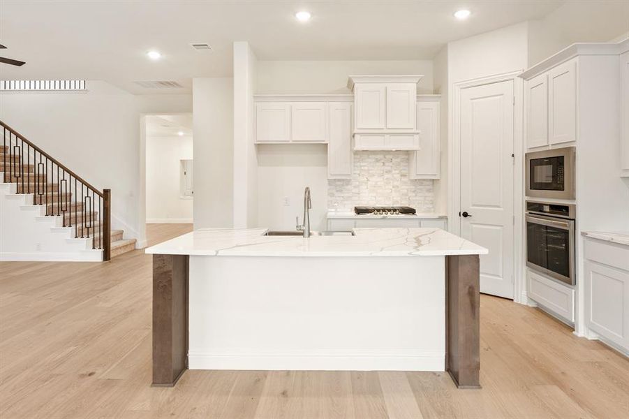 Furnished interior view inside a new home in Windsong Ranch Classic 61, Prosper (Image 10).