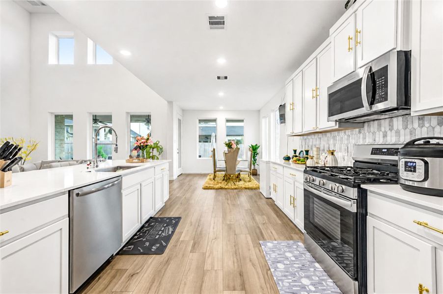 Furnished interior view inside a new home in Harvest Green, Richmond (Image 9).