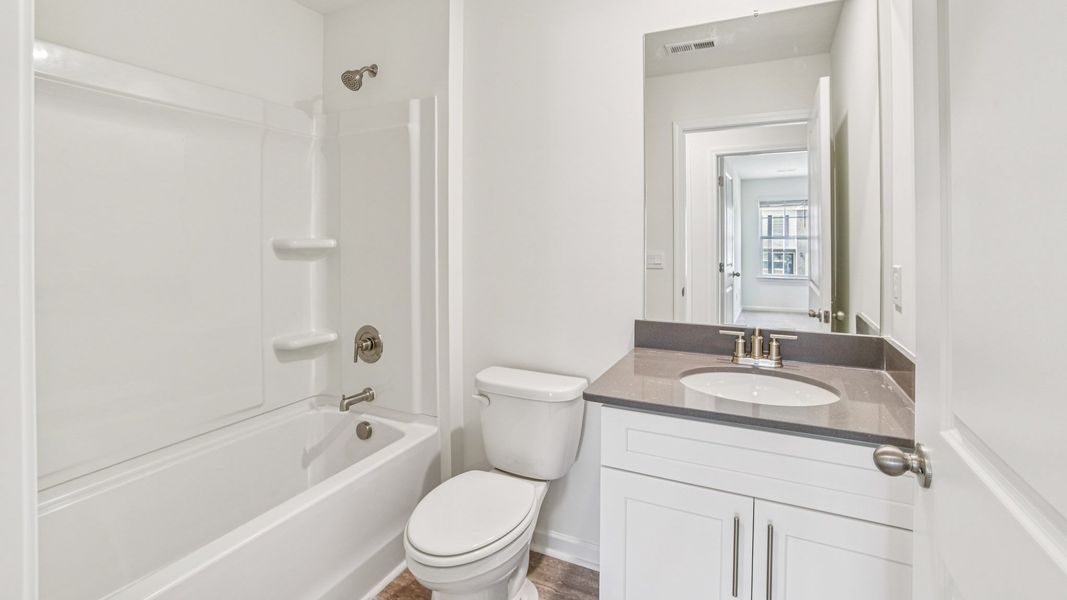 Representative furnished interior of a home built from the Craig by D.R. Horton in The Hideaway at Fox Meadows, Bluff City (Image 12).