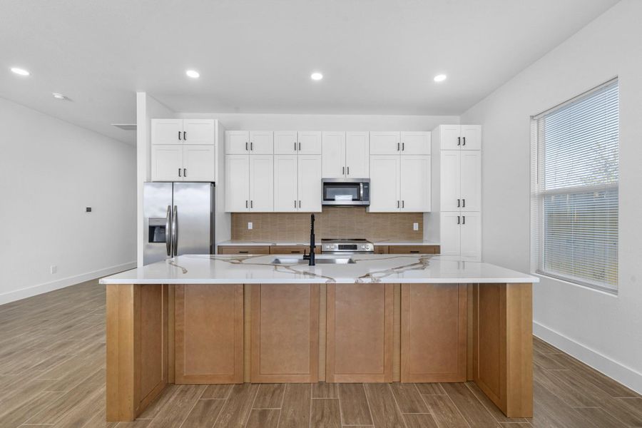 pictures are from another house built by the same builder