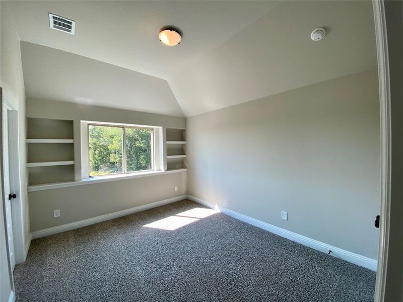 Bed #4 with built-in shelves & vaulted ceiling Bed #4 with built-in shelves & vaulted ceiling