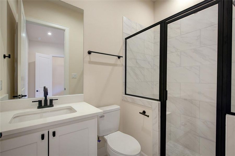 Full bathroom in office.