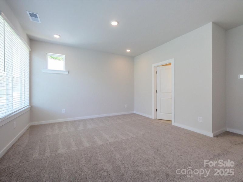 Spacious, unfurnished interior of a new home in Central Living at Craig, Charlotte (Image 26).