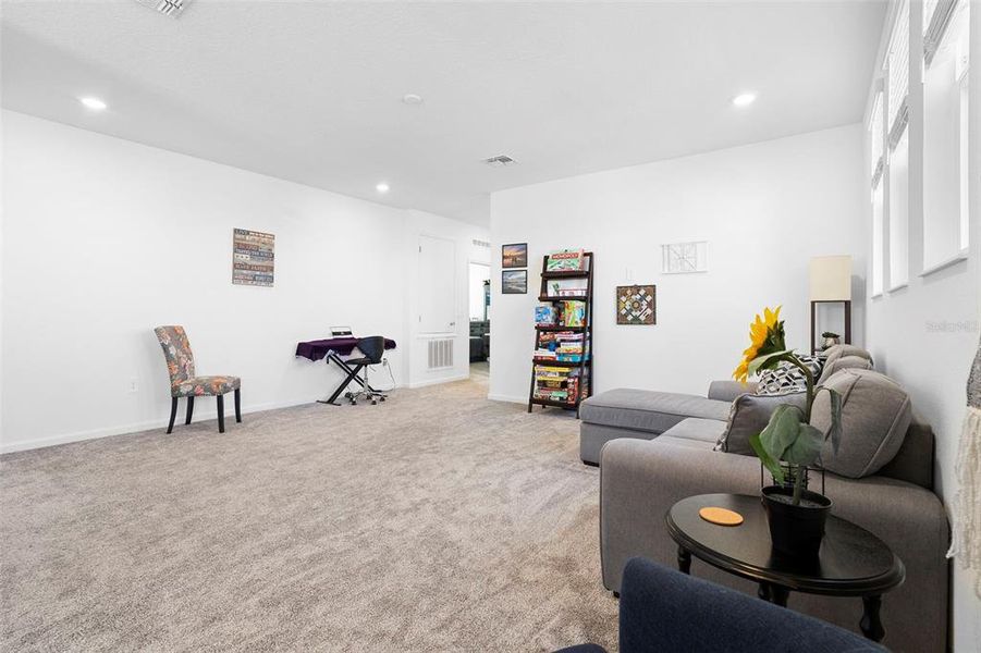 Furnished interior view inside a new home in Rhett's Ridge: Legacy Collection, Apopka (Image 31).