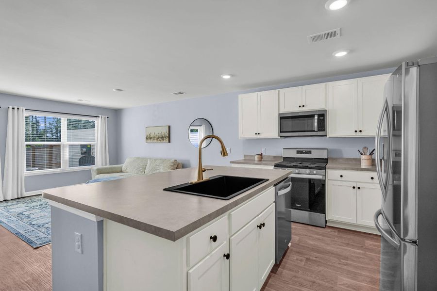 Furnished interior view inside a new home in , Summerville (Image 9).