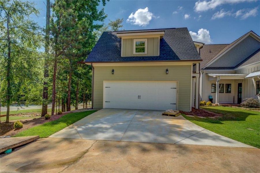 Front exterior of a new home in , Covington, GA, highlighting curb appeal (Image 26). Front exterior of a new home in , Covington, GA, highlighting curb appeal (Image 26).