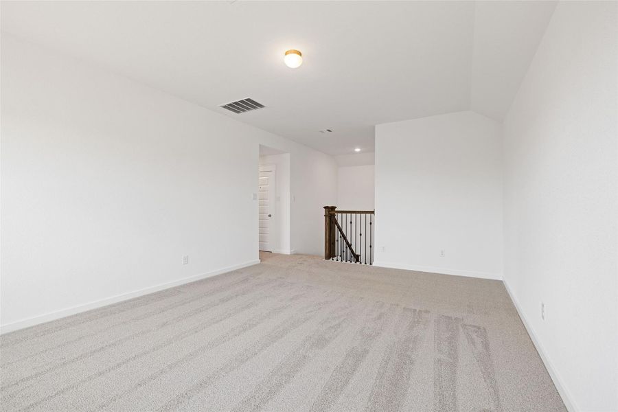 Spacious, unfurnished interior of a new home in Sunterra, Katy (Image 33).