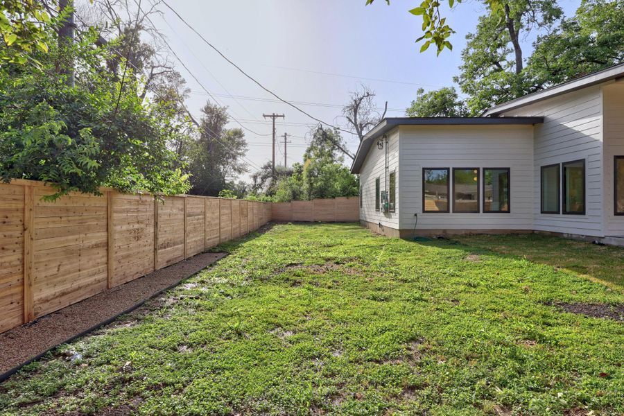 Private back yard featuring a newly constructed privacy fence Private back yard featuring a newly constructed privacy fence