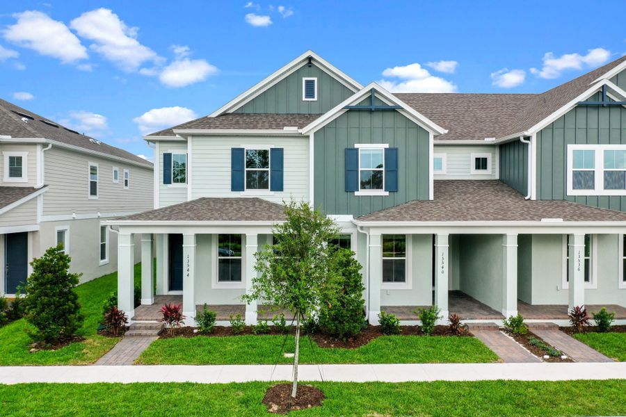Representative exterior photo of a completed home built from the Franklin by Rockwell Homes in Harvest at Ovation - Townhomes, Winter Garden, FL (Image 31). Representative exterior photo of a completed home built from the Franklin by Rockwell Homes in Harvest at Ovation - Townhomes, Winter Garden, FL (Image 31).