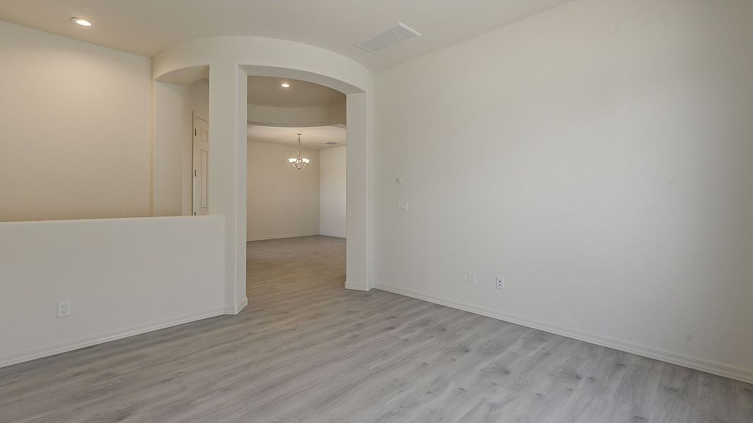 Furnished interior view inside a new home in Windrose, Waddell (Image 19).